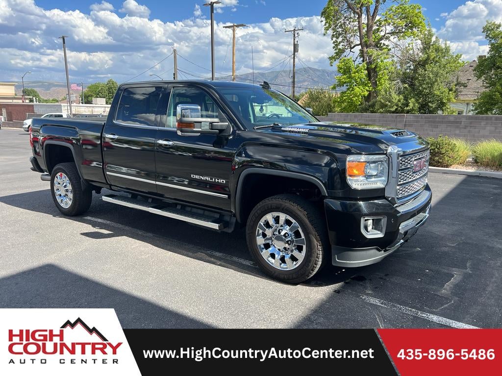 2019 GMC Sierra 2500 HD Denali in Onyx Black — front three-quarter view