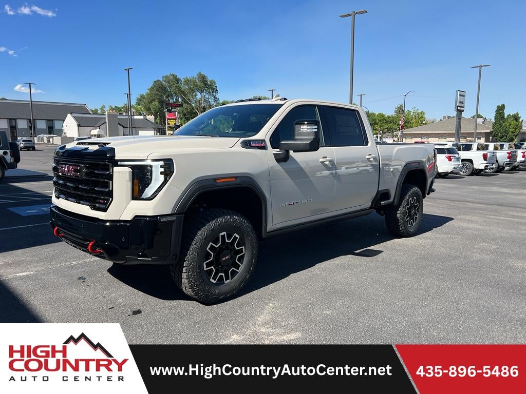 2026 GMC Sierra 2500 HD AT4X in Coastal Dune — front three-quarter view