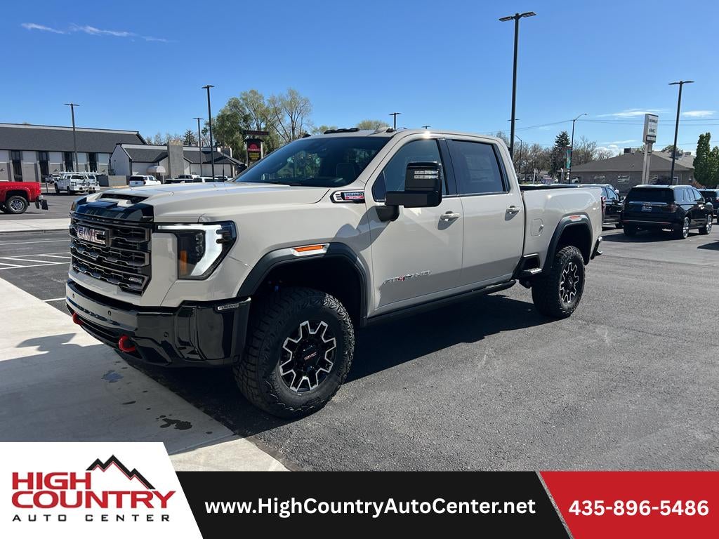 2026 GMC Sierra 2500 HD AT4X in Coastal Dune — front three-quarter view