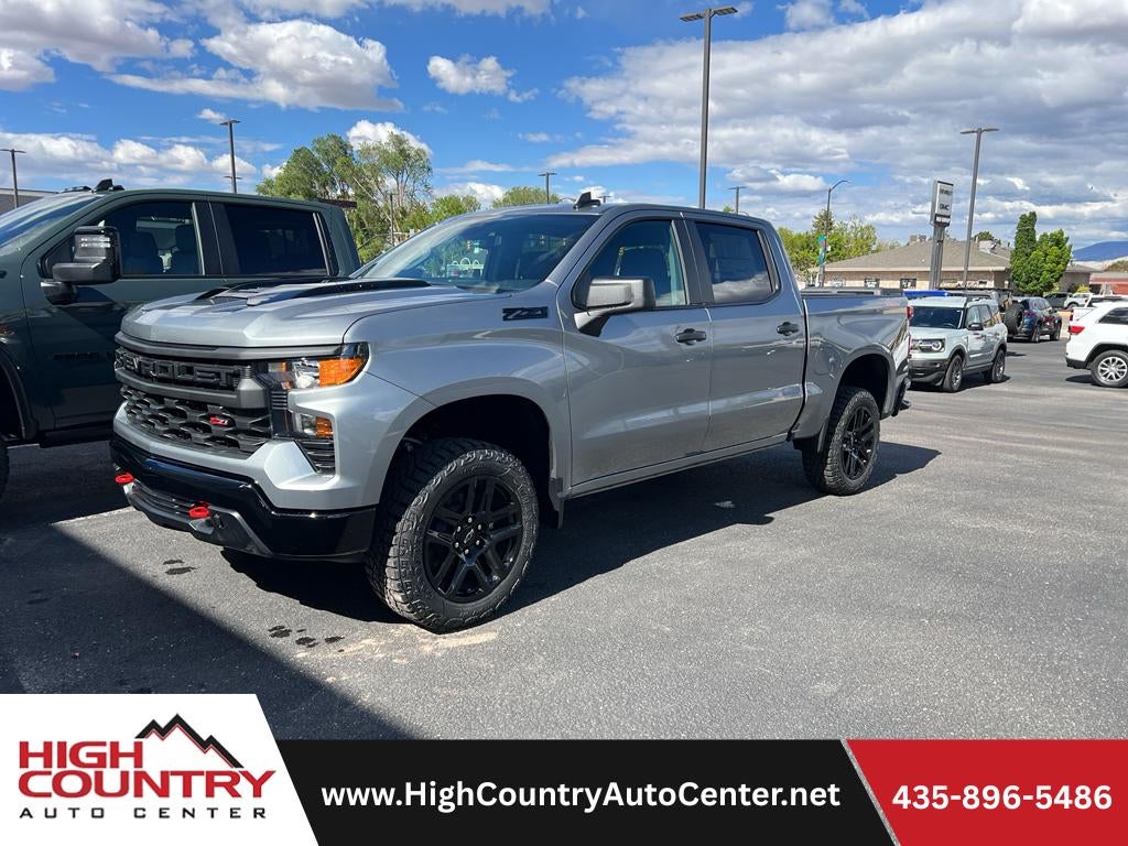 2026 Chevrolet Silverado 1500 Custom Trail Boss in Sterling Gray Metallic — front three-quarter view