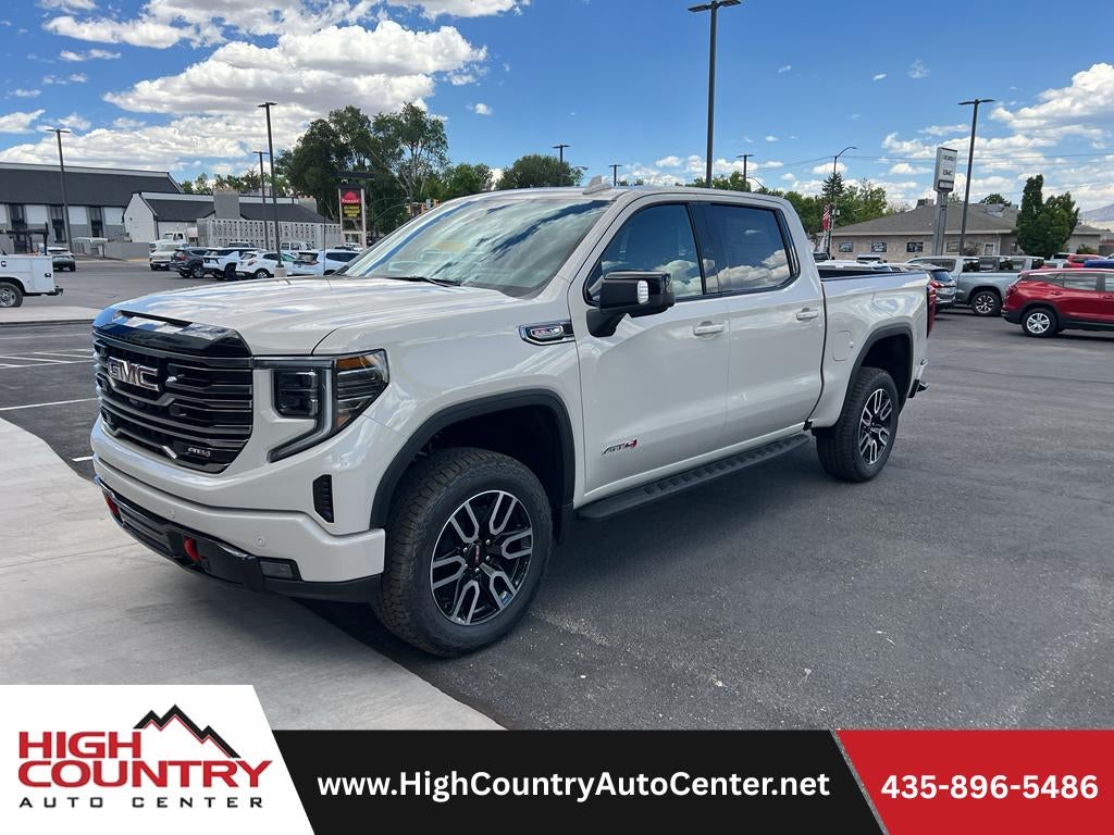 2026 GMC Sierra 1500 AT4 in Coastal Dune — front three-quarter view